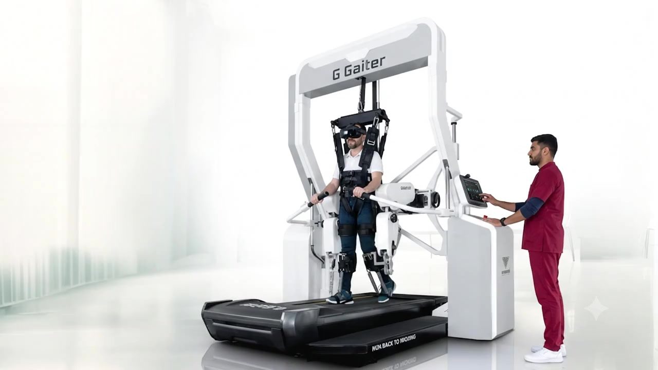 A patient walking on robotic gait-training equipment at Simorgh, supervised by a therapist